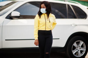 African-American-Woman-buying-used-car-SUV-White
